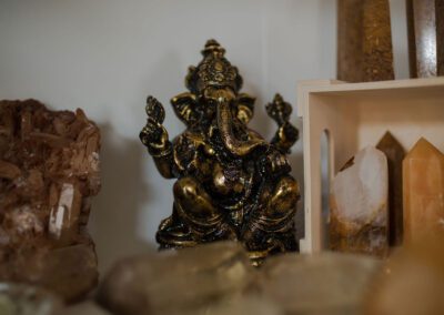 Gold statue and crystals
